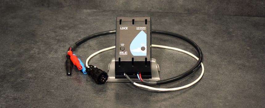 Test sensing cable for contamination or detected leaks